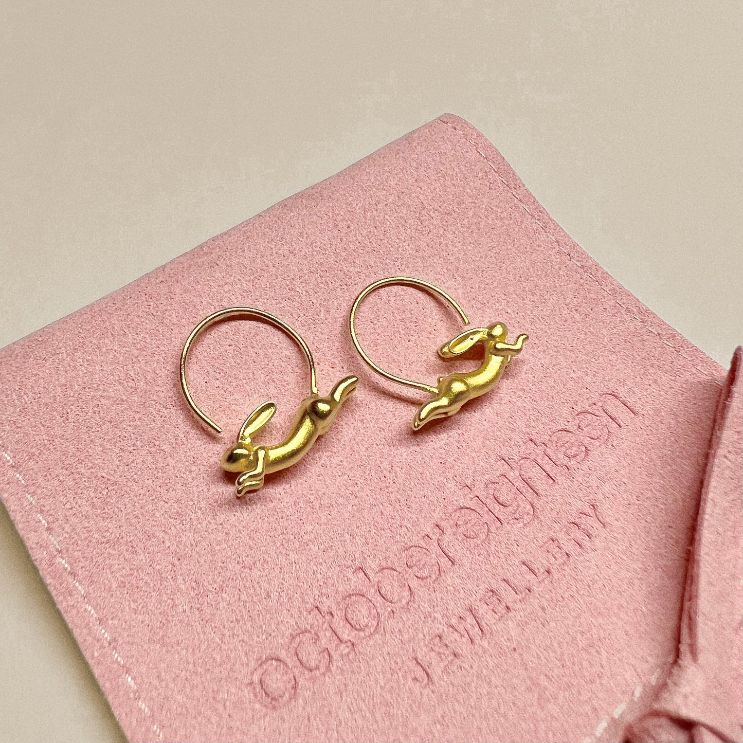 GOLDEN FLYING RABBIT HOOP EARRINGS